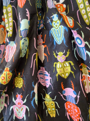 100% Cotton Fabric – Black With Colourful Bugs