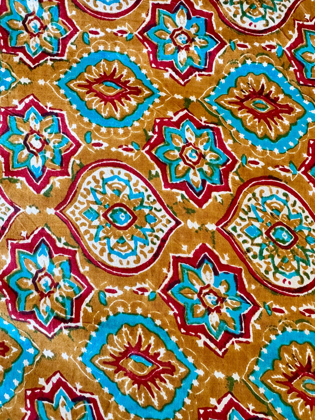 100% Cotton Fabric – Orange With Turquoise & Red Pattern