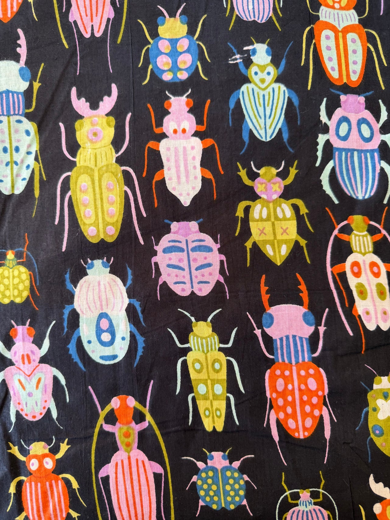 100% Cotton Fabric – Black With Colourful Bugs