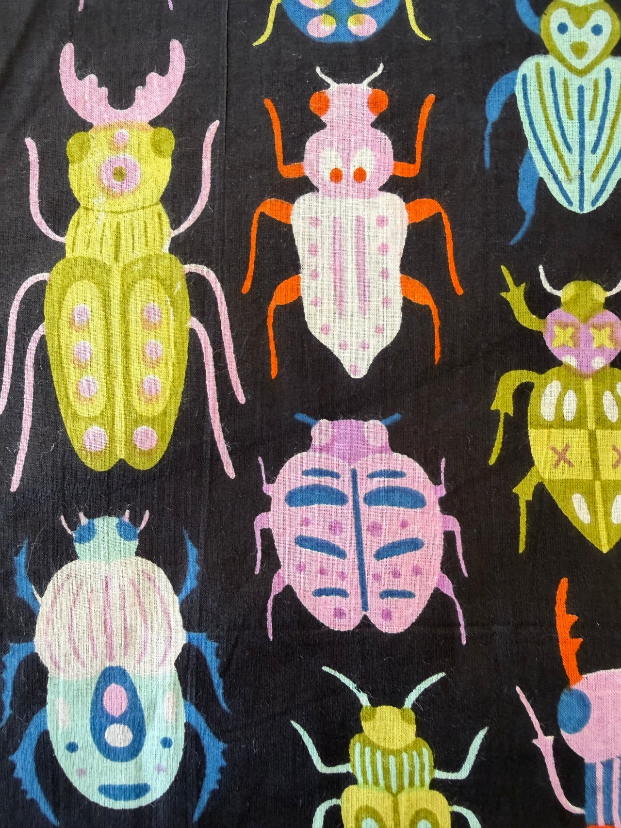 100% Cotton Fabric – Black With Colourful Bugs